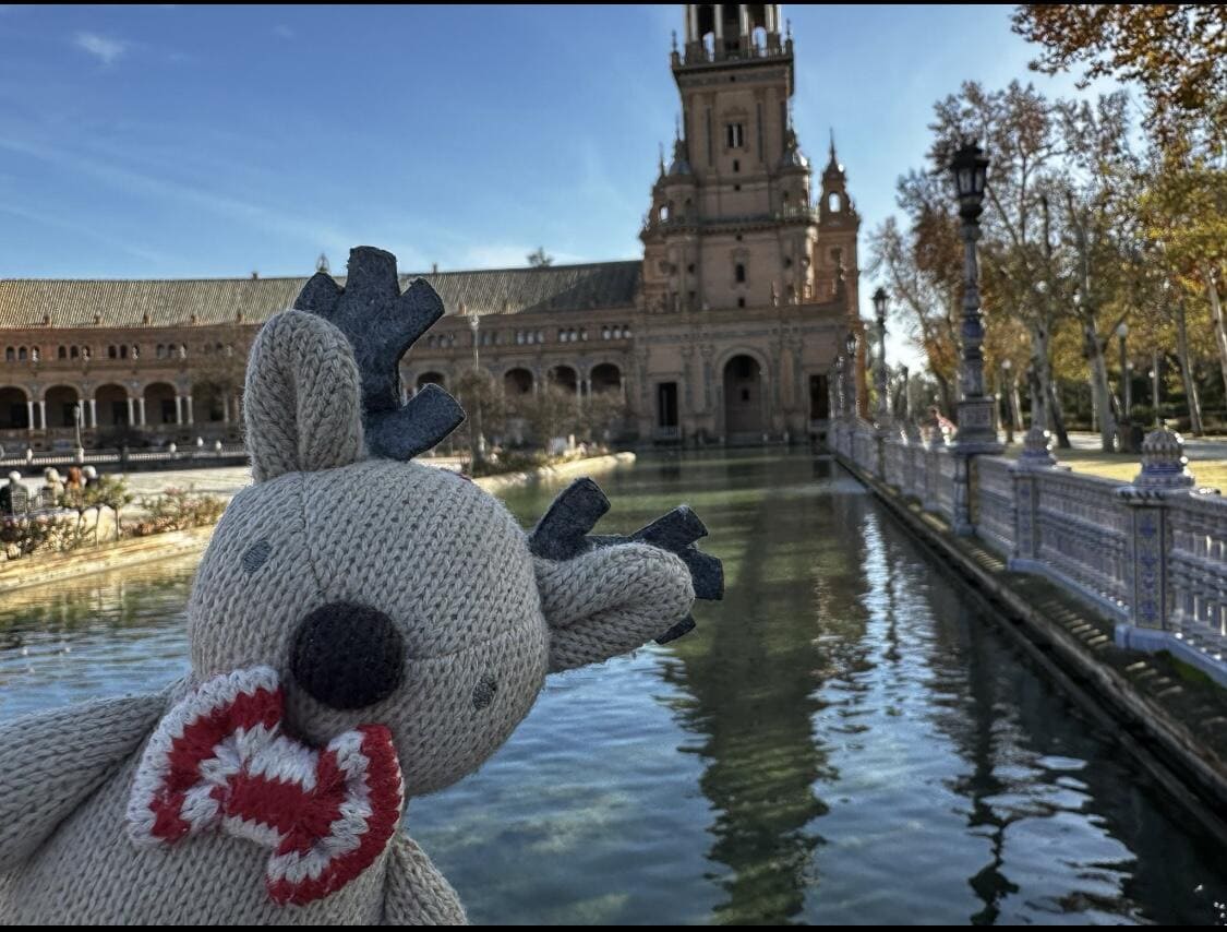 Rupert the reindeer in front of Plaza de España in Seville, Spain