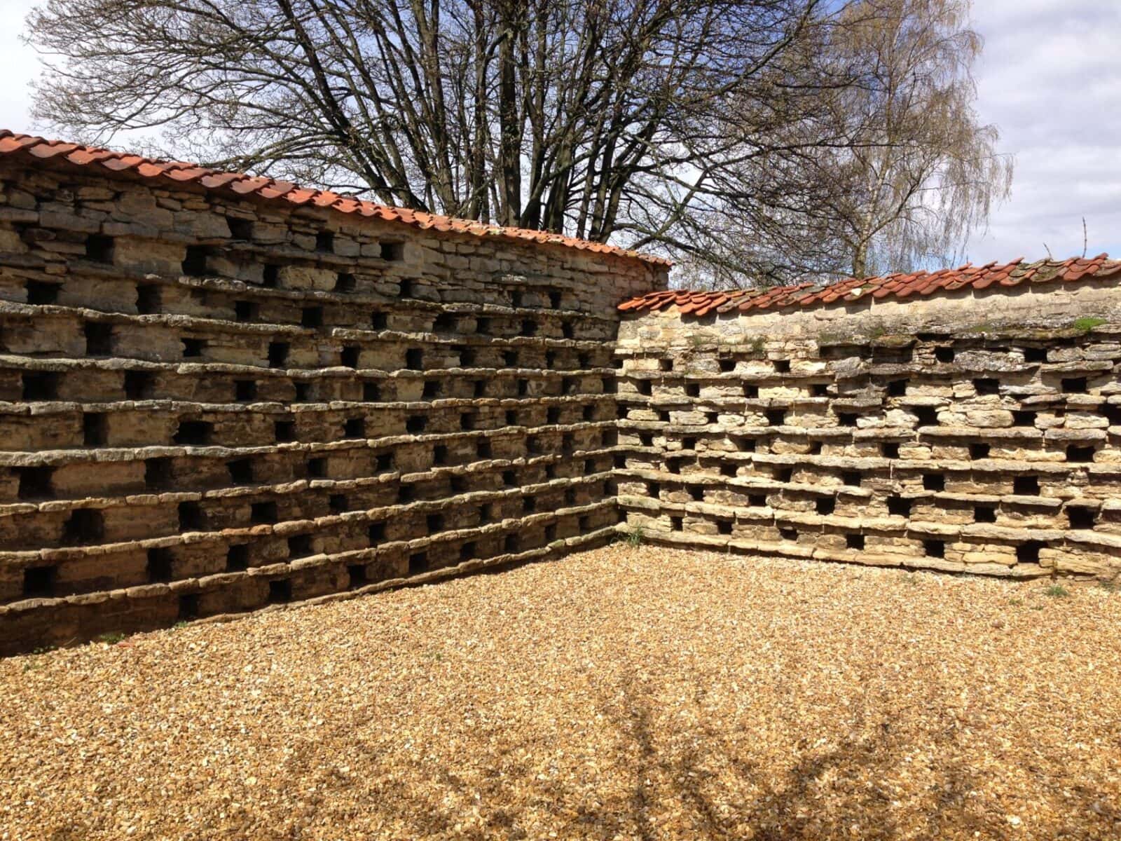 Medieval pigeon house with stone nesting holes in Higham Ferrers