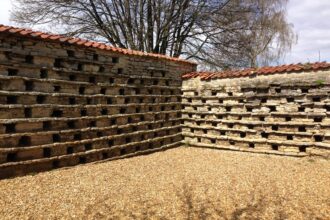 Medieval pigeon house with stone nesting holes in Higham Ferrers