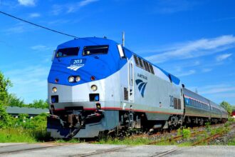 Amtrak train traveling through the United States on a clear day