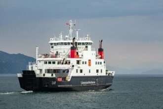 Caledonian MacBrayne ferry MV Coruisk sailing off the west coast of Scotland.