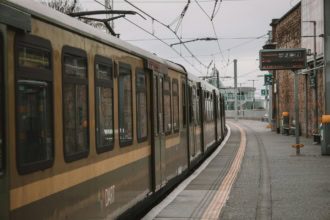 DART commuter train at a station in Dublin, Ireland.