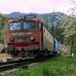 CFR train running through Romania’s Carpathian Mountains.