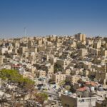 Cityscape of Amman, Jordan with hillside buildings
