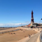Blackpool Tower and Central Beach on a sunny day in Lancashire, England