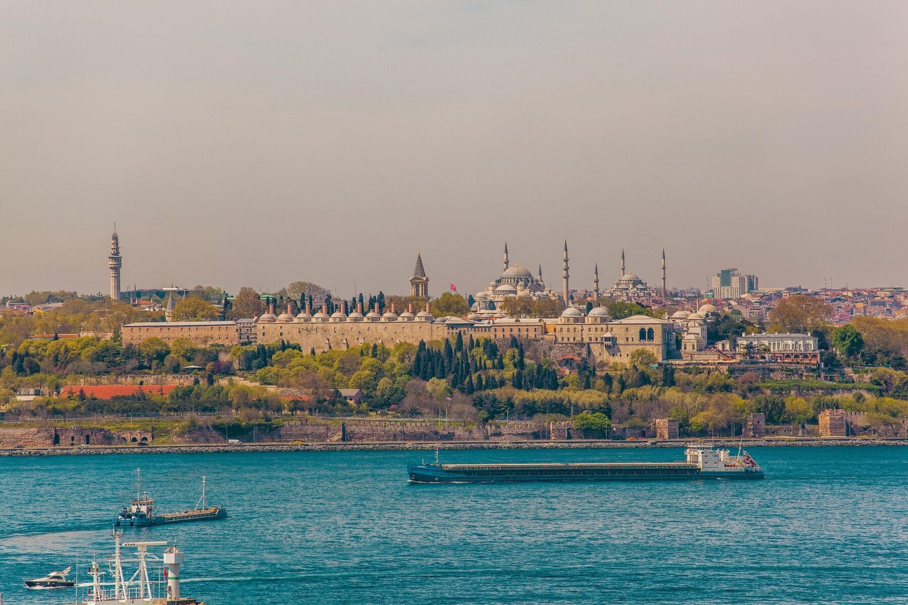 Ferries on the Bosphorus with the Süleymaniye Mosque in the background, Istanbul.