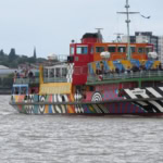 Mersey Ferry Snowdrop sailing across the River Mersey with its colourful Dazzle design by Sir Peter Blake.