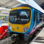 TransPennine Express train at Manchester Airport railway station platform