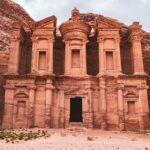 Obelisk Tomb and Triclinium carved into sandstone cliffs in Petra, Jordan