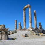 Temple of Hercules ruins at Amman Citadel under clear blue sky