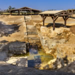 Archaeological remains at the Baptism Site of Jesus in Jordan, showing ancient steps and water channels.
