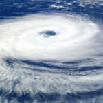 Satellite image of a powerful tropical cyclone with a clear eye over the ocean