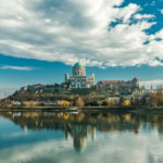Esztergom Basilica overlooking the Danube River on a clear day.