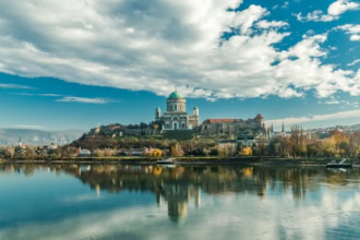 Esztergom Basilica overlooking the Danube River on a clear day.
