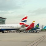 Line-up of IAG airline aircraft tails — British Airways, Iberia, Aer Lingus, Vueling and LEVEL — at London Heathrow ahead of the Starlink Wi-Fi installation programme.