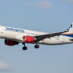 SunExpress Airbus aircraft on final approach during daylight