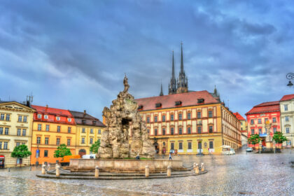 Zelný trh market square in Brno with the Parnassus Fountain and cathedral spires