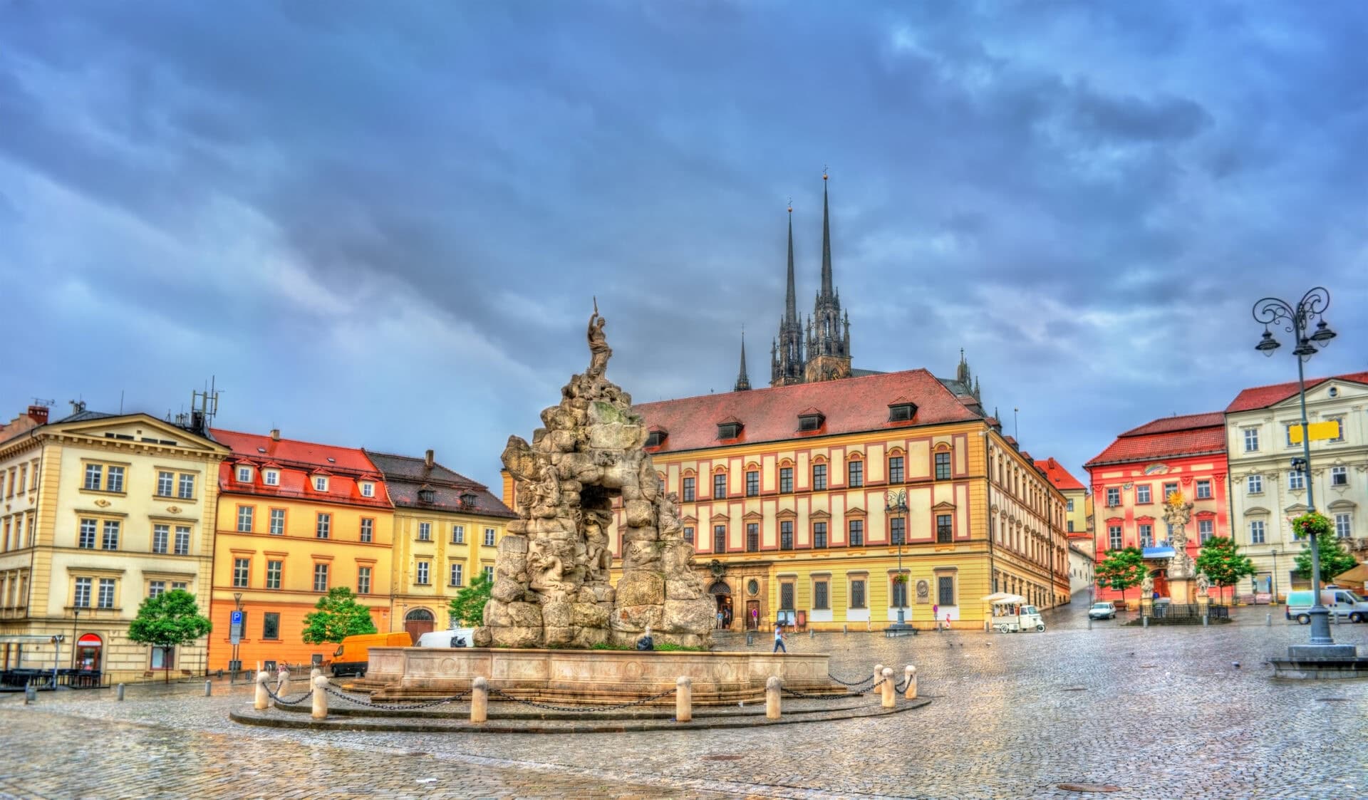 Zelný trh market square in Brno with the Parnassus Fountain and cathedral spires
