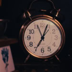 Alarm clock showing early morning time before extreme day trips UK flight departure