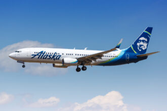 Alaska Airlines Boeing 737 aircraft flying on a domestic route in the United States