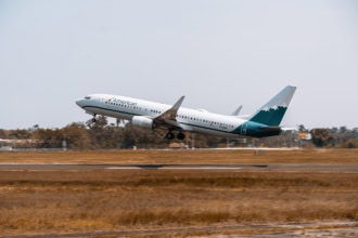 American Airlines aircraft taking off from runway during commercial passenger flight