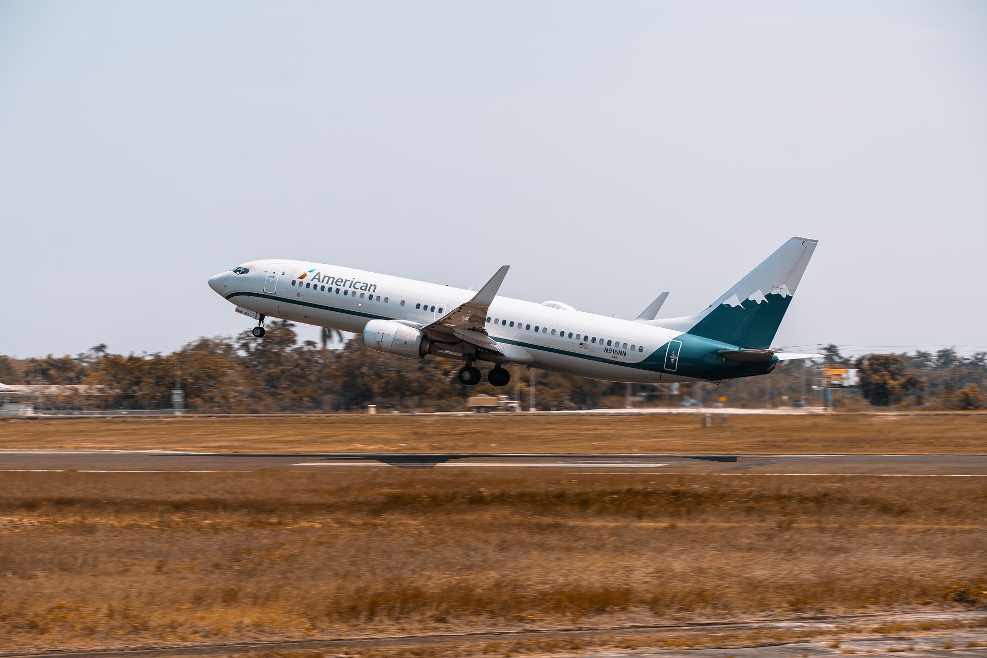American Airlines aircraft taking off from runway during commercial passenger flight