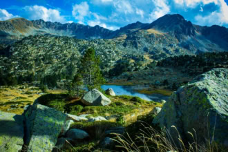 Pyrenees mountains landscape between Toulouse and Andorra with lake and rocky peaks