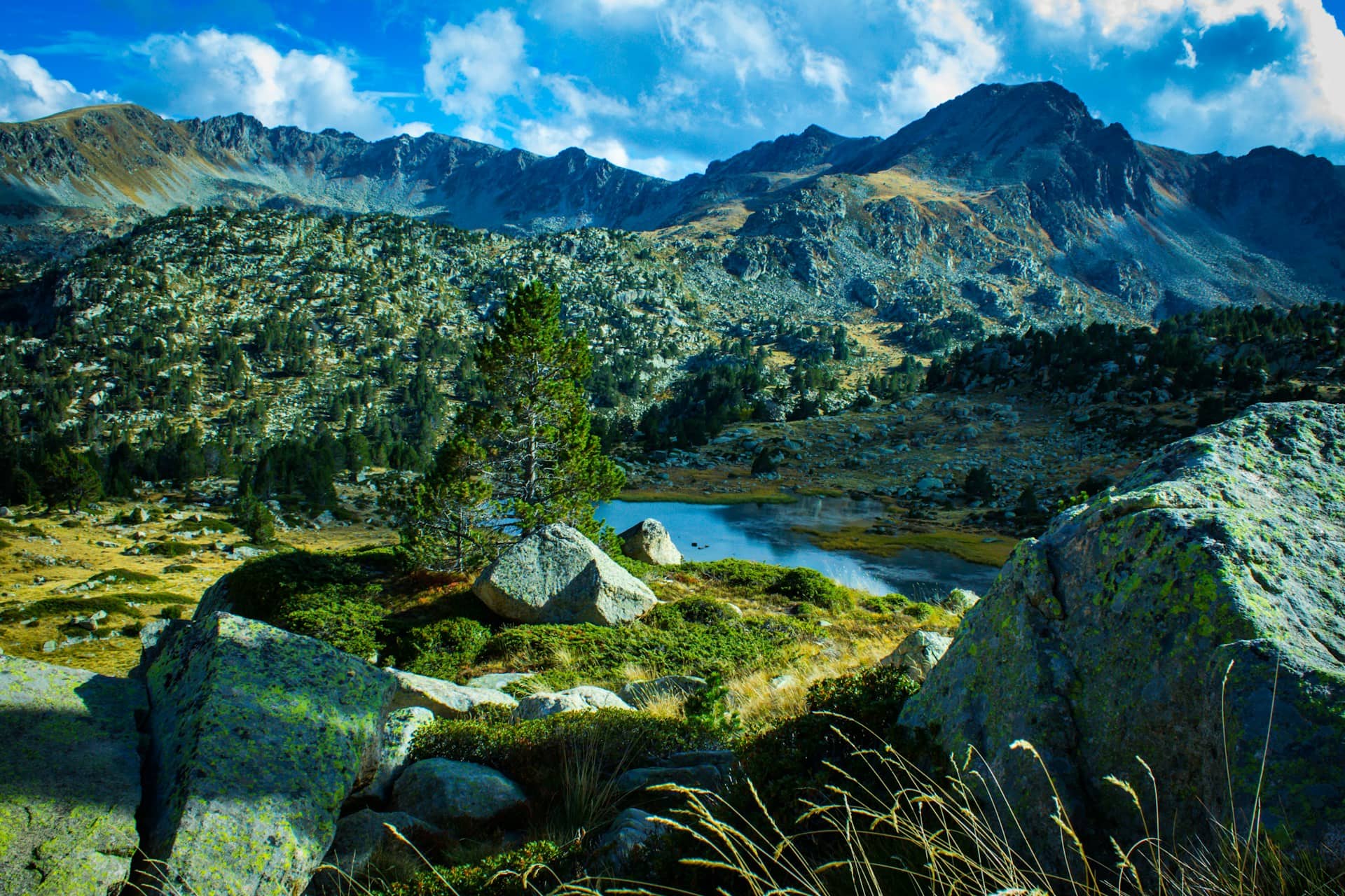 Pyrenees mountains landscape between Toulouse and Andorra with lake and rocky peaks