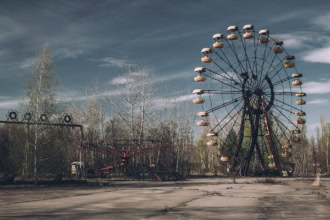 Abandoned ferris wheel in Pripyat Chernobyl dark tourism site