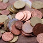 Pile of euro coins representing saving money on holiday and travel budgeting