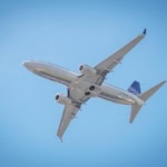 Copa Airlines aircraft flying in clear blue sky