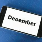 December travel destinations planning on smartphone screen