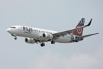 Fiji Airways aircraft landing at airport runway