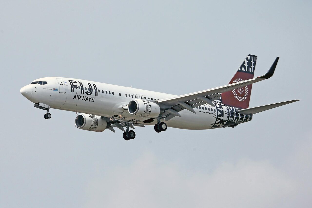 Fiji Airways aircraft landing at airport runway