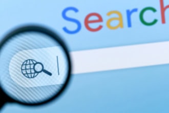 Google search bar with magnifying glass representing Google Flights flight search tool