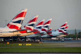 British Airways aircraft tails at London airport runway