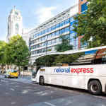 National Express coach parked on a London street near Victoria Coach Station used for long-distance bus routes across the UK