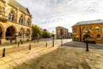 Historic market square and town centre buildings in Northamptonshire England