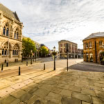 Historic market square and town centre buildings in Northamptonshire England