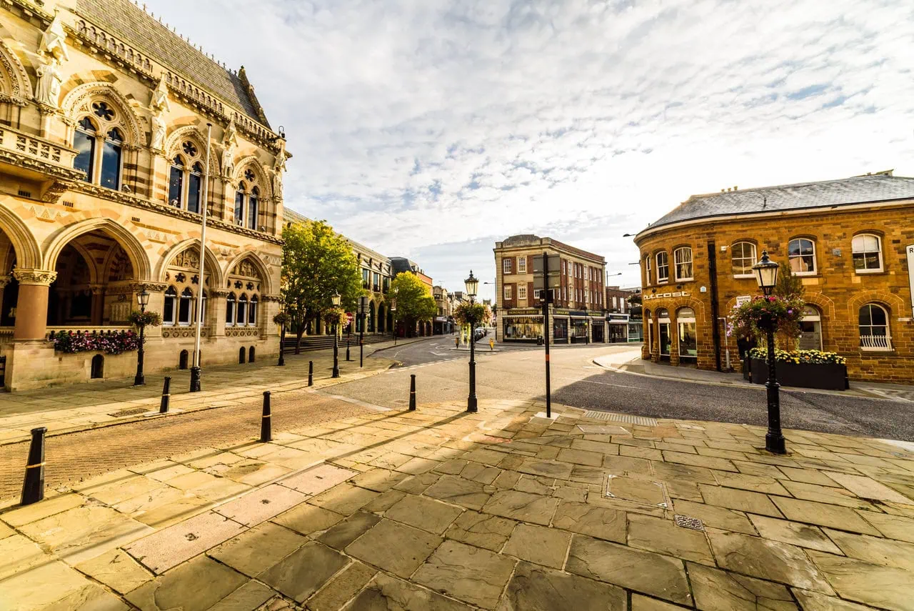 Historic market square and town centre buildings in Northamptonshire England