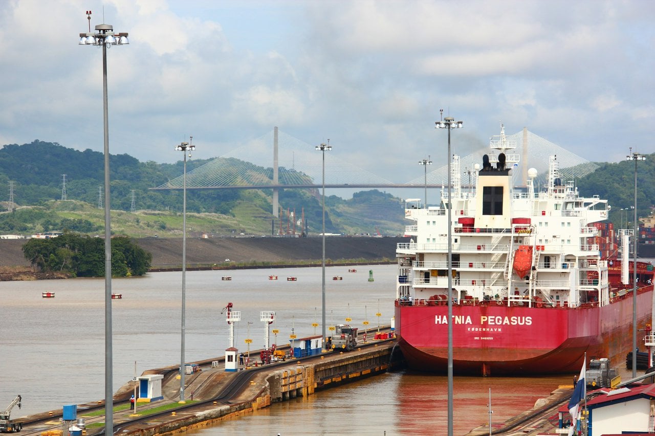 Cargo ship passing through Panama Canal locks near Panama City