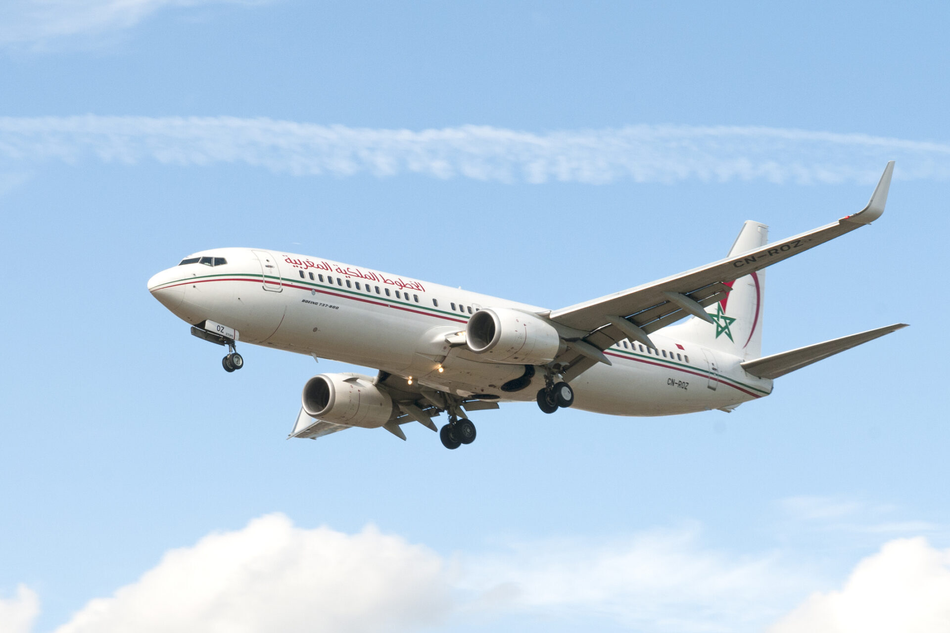 Royal Air Maroc Boeing 737 aircraft flying in clear blue sky