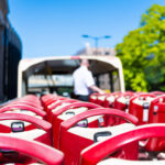Upper deck seats on a hop-on hop-off sightseeing bus during a city tour