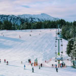 Skiing in Andorra Pyrenees ski resort slopes and chairlift