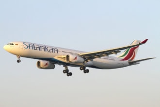 SriLankan Airlines Airbus aircraft landing at sunset
