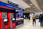 Airport currency exchange counter where travellers may receive poor exchange rates