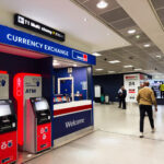 Airport currency exchange counter where travellers may receive poor exchange rates