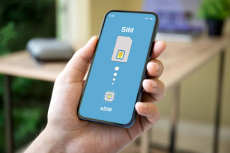 Smartphone showing eSIM activation for mobile data travel