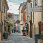 Carcassonne old town street with medieval buildings on a day trip from Toulouse