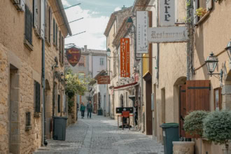 Carcassonne old town street with medieval buildings on a day trip from Toulouse